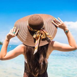 woman-summer-vacation-wearing-straw-hat-shutterstock_503642464-1024x683